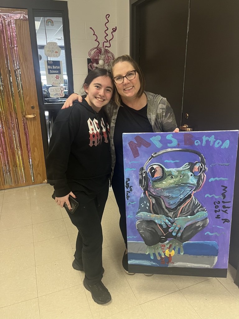In 8th grade Art class, the students made a painting for a teacher or staff member who meant a lot to them while they have been here at the Jr. High. Maddie R presented her painting to Mrs. Barton.