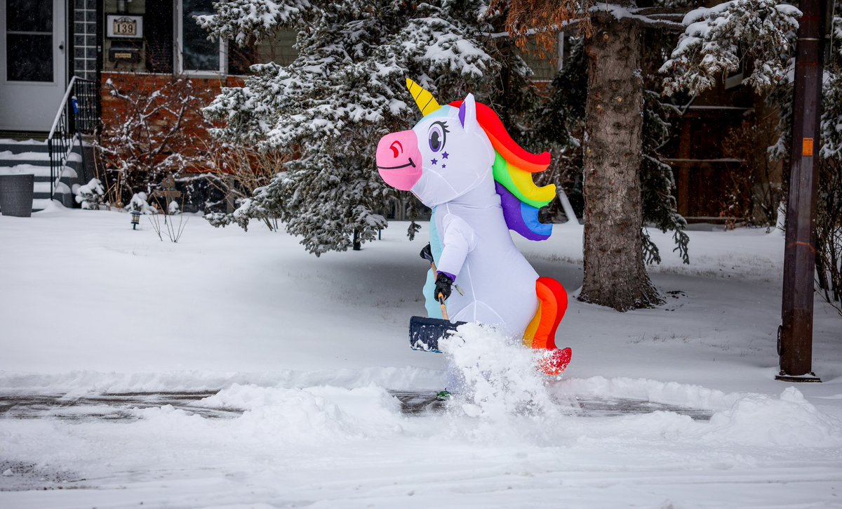 It may be the first days of Spring but there was snow to be shovelled in #yyc Vanessa Ronksley wanted to do more than clear her sidewalks, she wanted to put smiles on the faces of passersby, so she donned a unicorn costume to do her morning chore. #springstorm #snowday