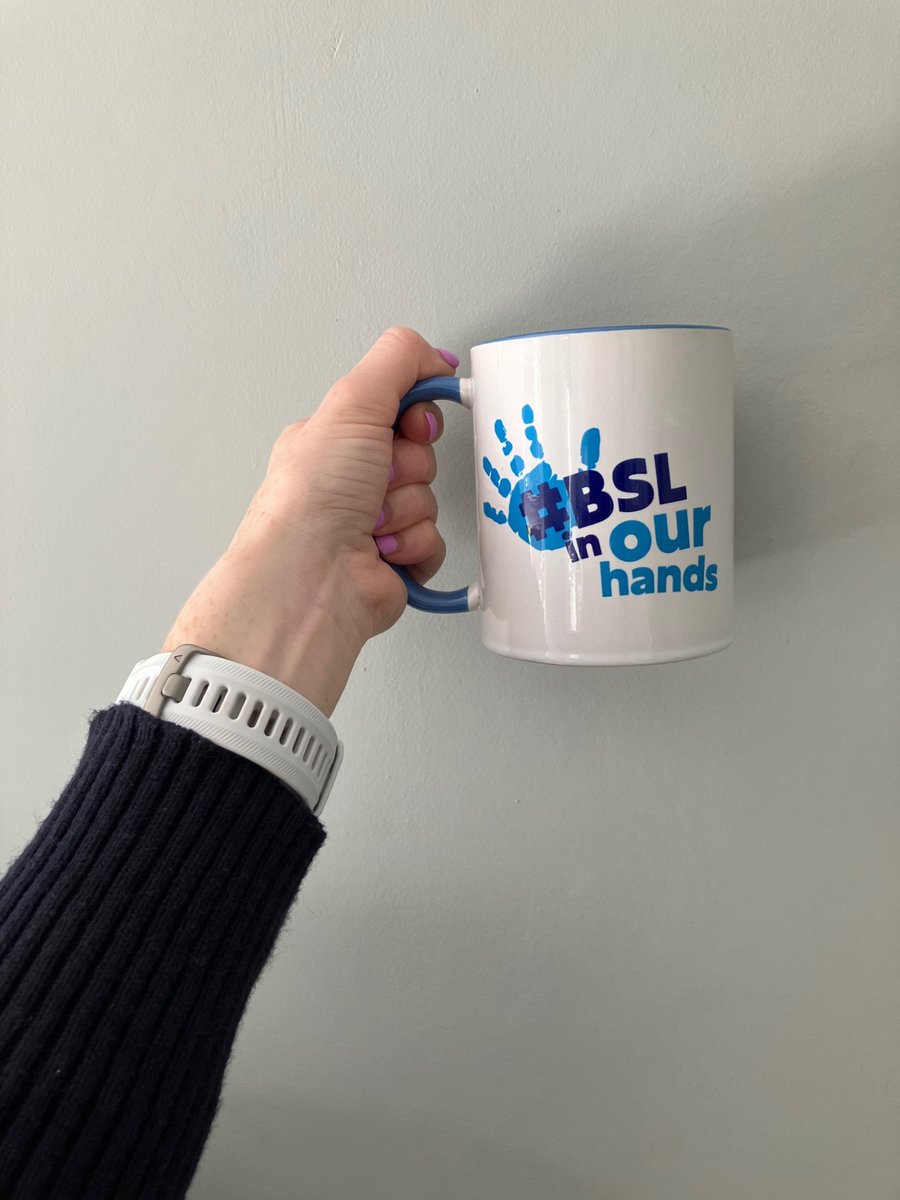 DrJussieDee's tweet image. Happy #SignLanguageWeek! Proudly replacing my Chris Whitty mug with this one. On Monday, @BDA_Deaf launched their #BSLInOurHands campaign - one very close to my heart. Deaf children have a right to BSL, their natural language, from *day 1*. #BlueOutforBSL