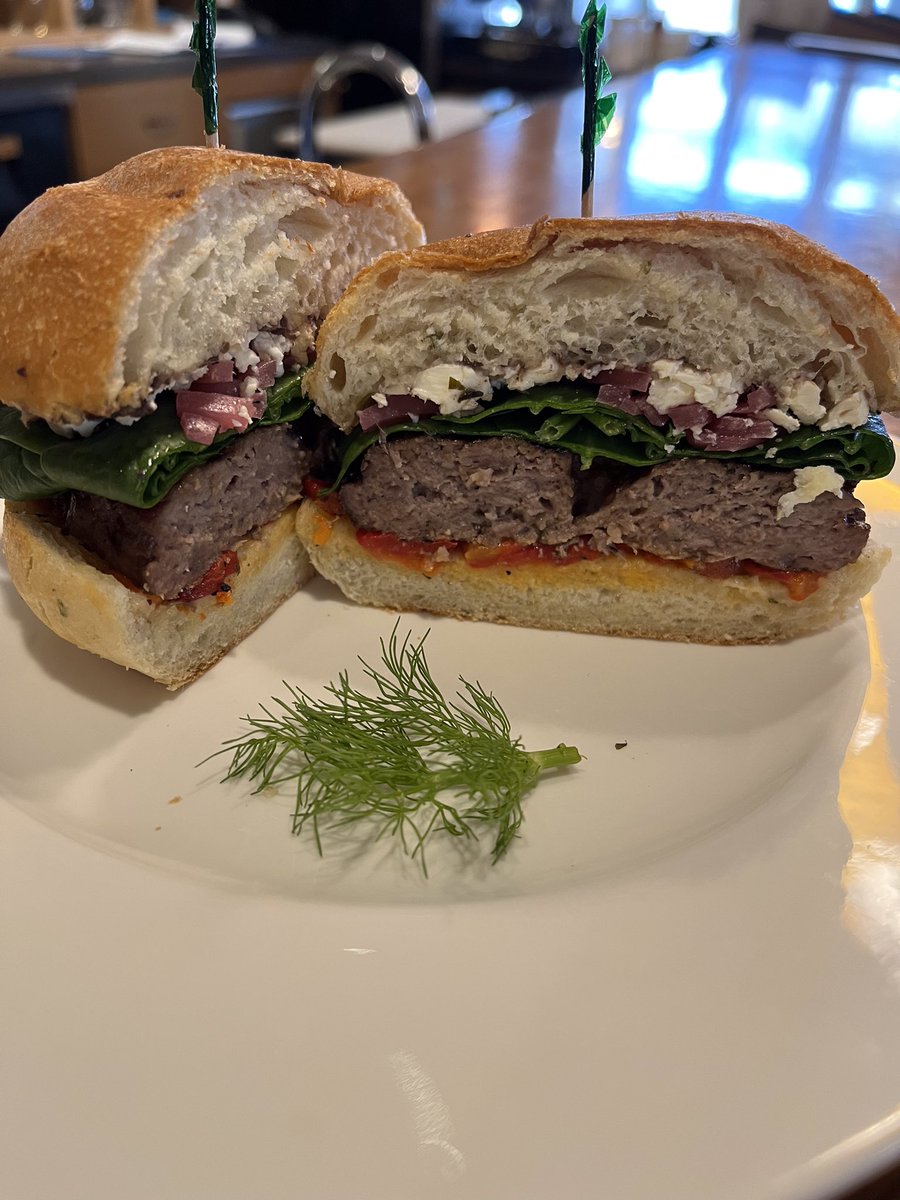 Gabrieaus's tweet photo. Our Mediterranean Lamb Burger for Burger Week — topped w/ tapenade, feta, spinach, pickled red onions, grilled marinated peppers on a potato onion bun. Served with your choice of salad or home cut fries. #burgerweek #burgerlovers #dinnertime #dineout #dinneridea #foodie https://t.co/IlxadbLPBA