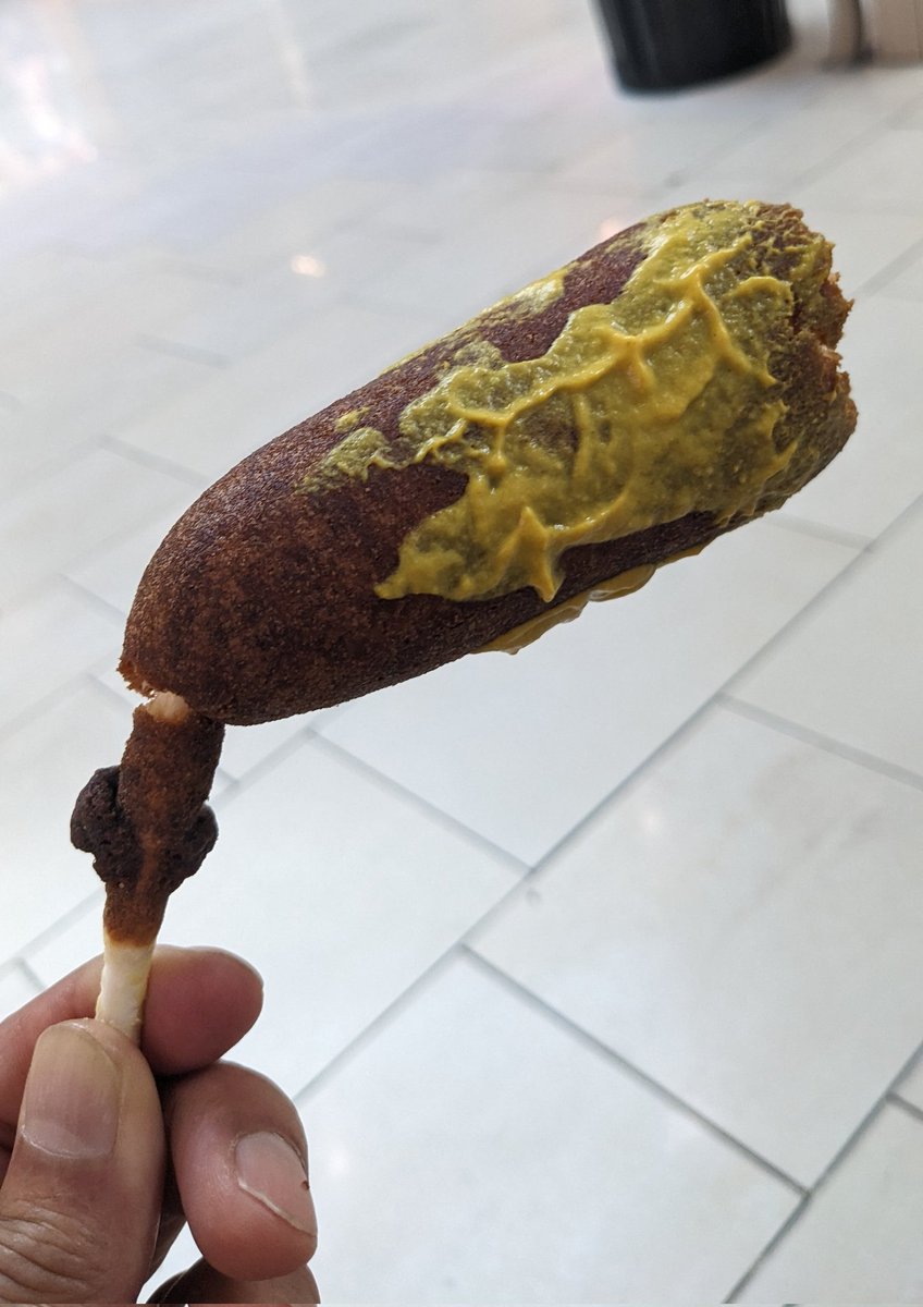 Hot dog on a limp stick.