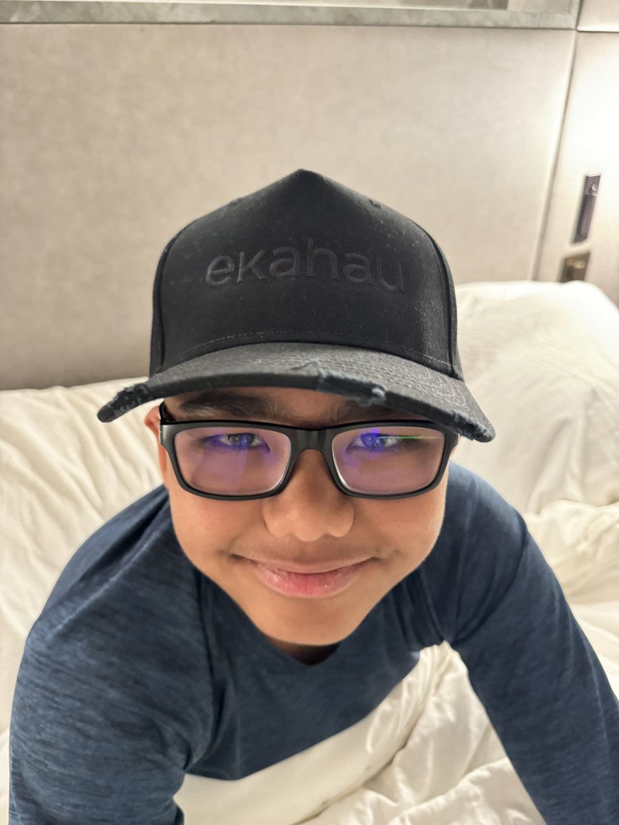 The little marketing assistant got a hold of the @ekahau hat. It looks good on him. #WiFiDesignDay