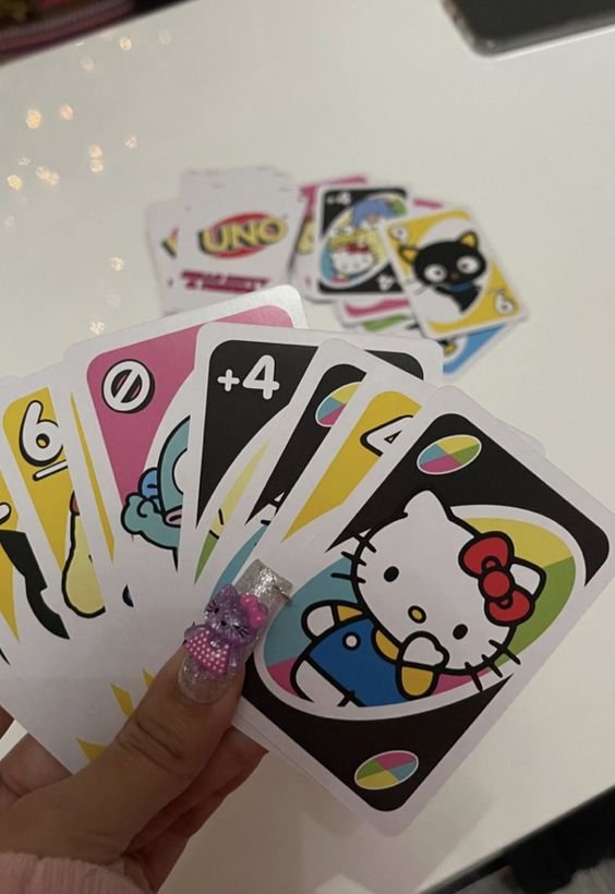 lovesickdoe's tweet photo. hello kitty uno https://t.co/ehzS78OzWR