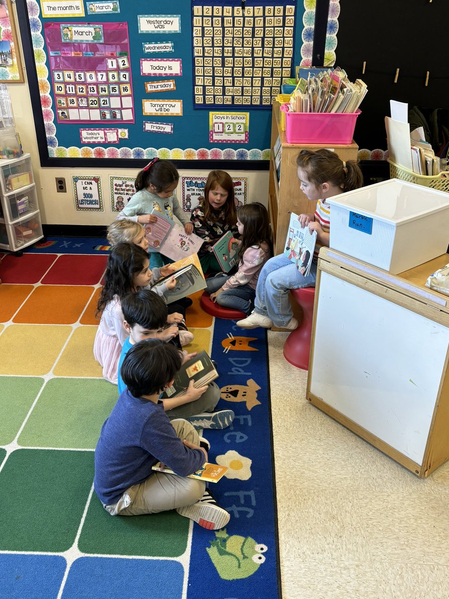 BPESchool's tweet photo. KL is sharing their favorite book with a friend! #parpweek https://t.co/xcW81z2g5E