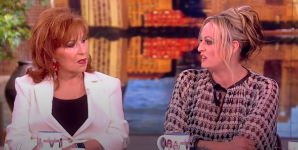 Stormy Daniels was a guest on The View Thursday and likened Trump supporters who threatened her to 'suicide bombers.' breitbart.com/clips/2024/03/…