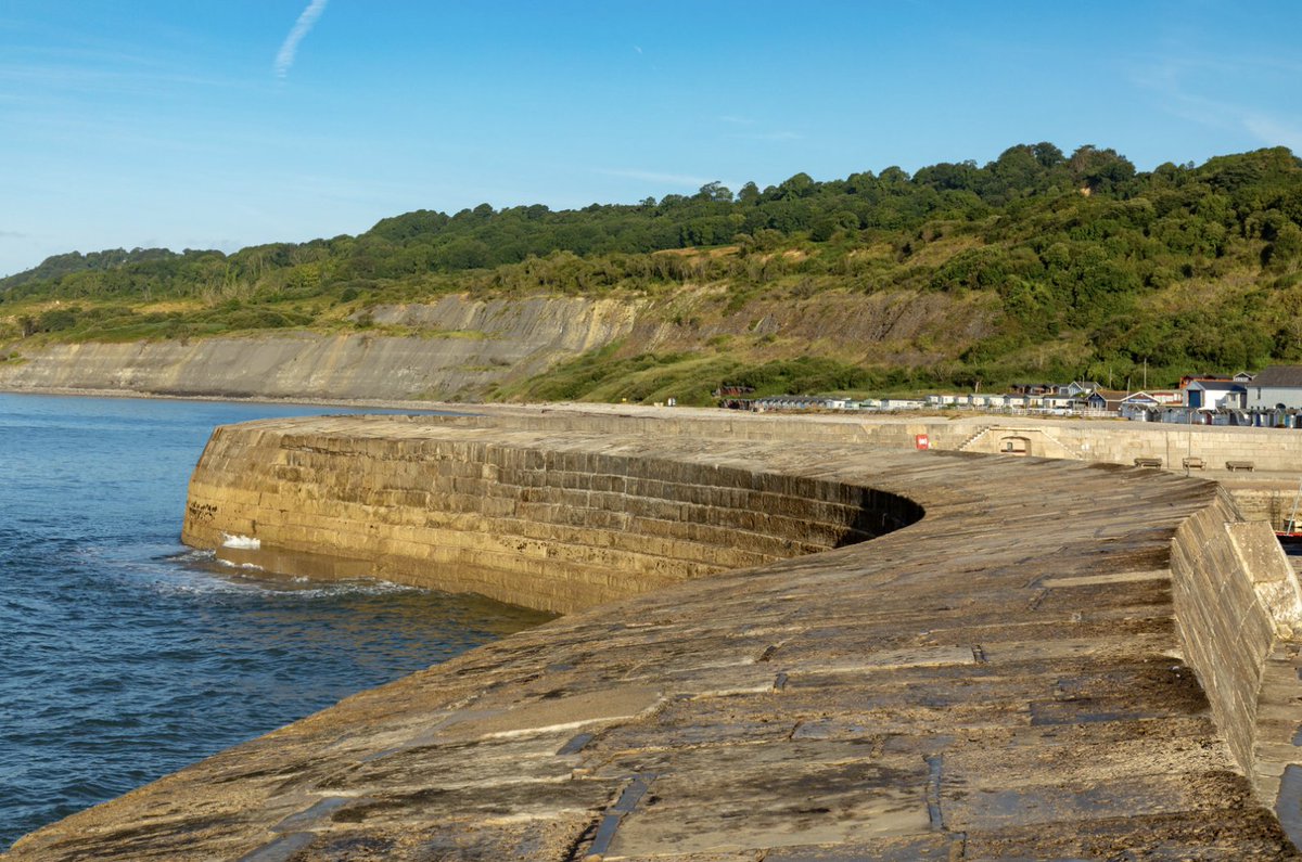 A historic unspoiled seaside resort, Lyme Regis is surrounded in natural beauty. The harbour is located on the west side of the town and includes the iconic Cobb wall, an internationally famous stone-built breakwater and jetty. Learn more 🔗 bit.ly/3x2wa7j