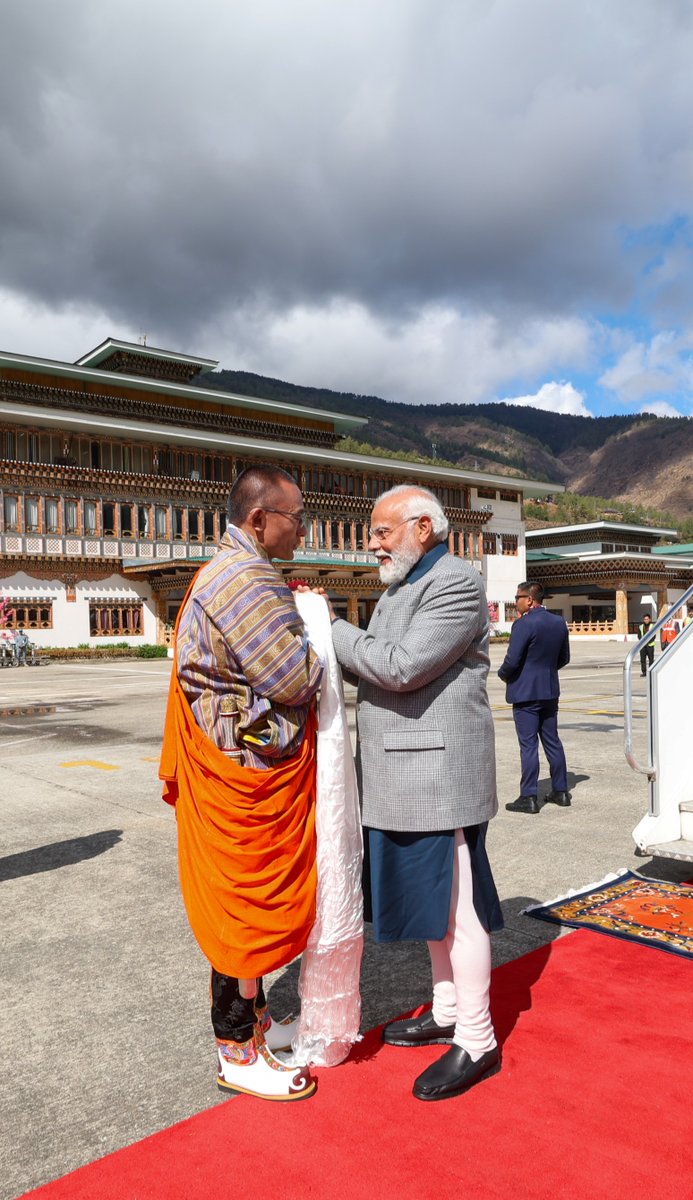 narendramodi's tweet photo. Thank you for the warm welcome to Bhutan, PM @tsheringtobgay. May India-Bhutan friendship keep scaling new heights. https://t.co/JLtHWUqPSi