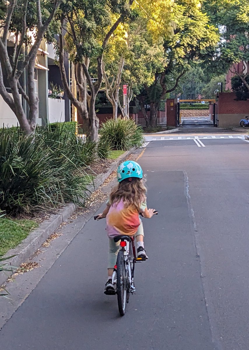 Rain or shine, every day is #Ride2School Day for 6yo Hanna. Support the campaign for Better Streets  so that more children in Australia can have this opportunity. <a href="/BetterSts4AUS/">BetterStreets Australia</a> #30please
betterstreets.org.au/get-involved.h…