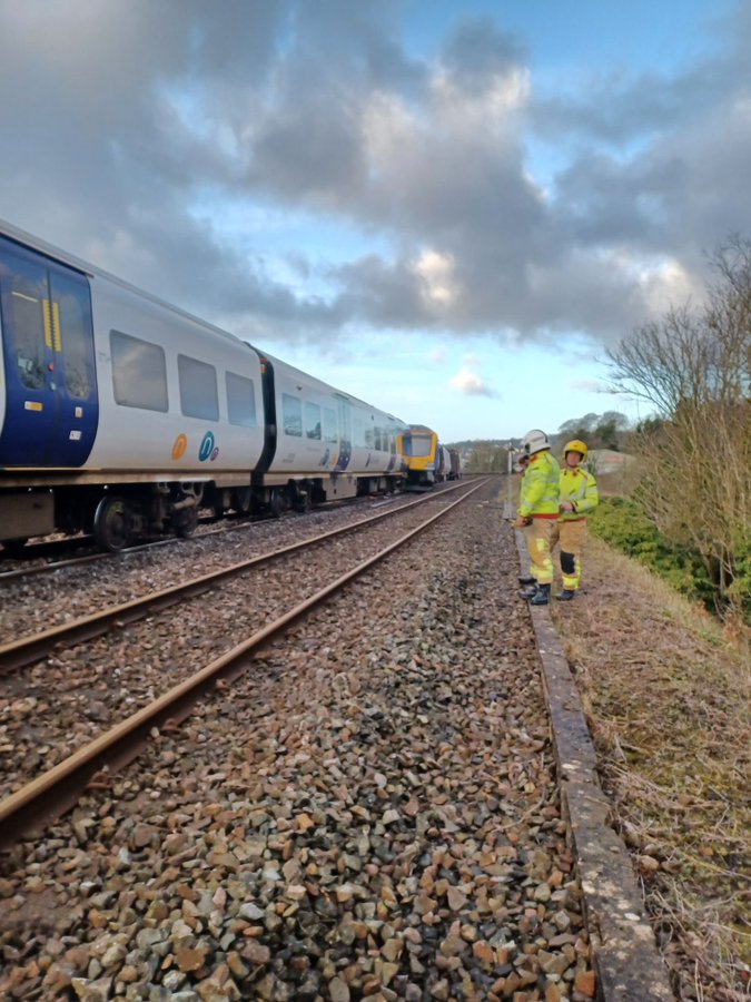 Emergency responders at the site of the train derailment in Grange over Sands