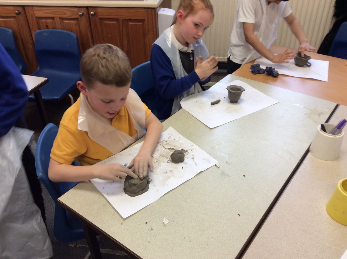 In Art class Sea have been designing and creating pots inspired by ancient Greek pottery.