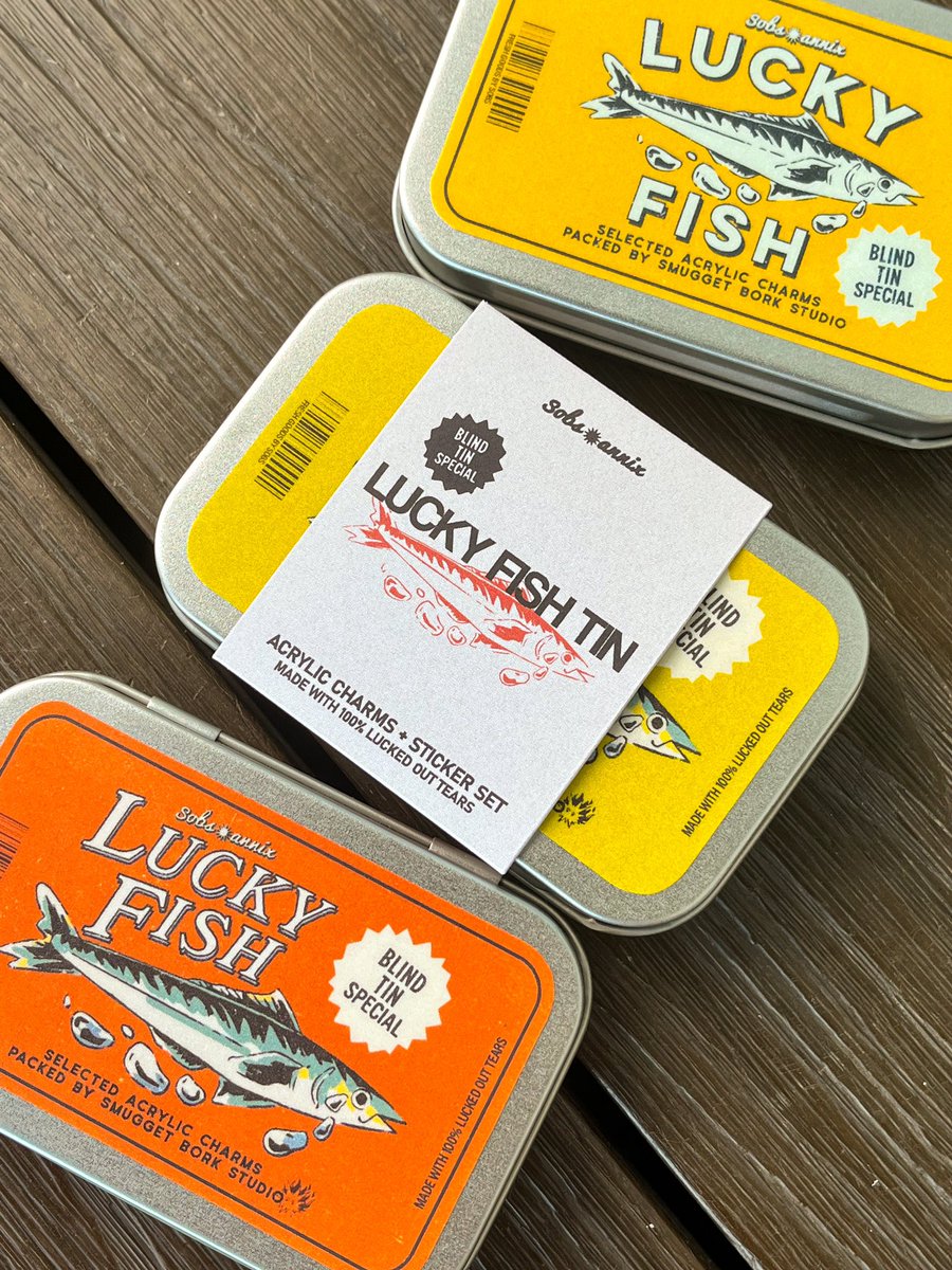 sobsannix's tweet photo. 🎣 lucky fish blind box/tin! 
get 1 out of 3 random fisherfolk charms alongside their lucky catch of the day + a sticker set in each tin! 

available this komiket weekend at table 107! 🐟🐠🐡 https://t.co/OQR1MA2GbT