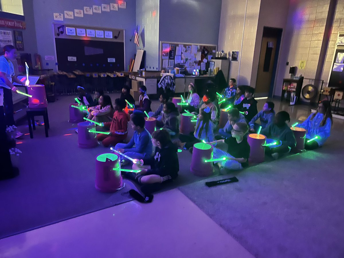 AP_Renner's tweet photo. Our students are so lucky to have a rich and vibrant music program!  They loved the black lights and light up drum sticks that they got to use during their lesson! #MrsBobelRocks https://t.co/AkJ0wAlBvm