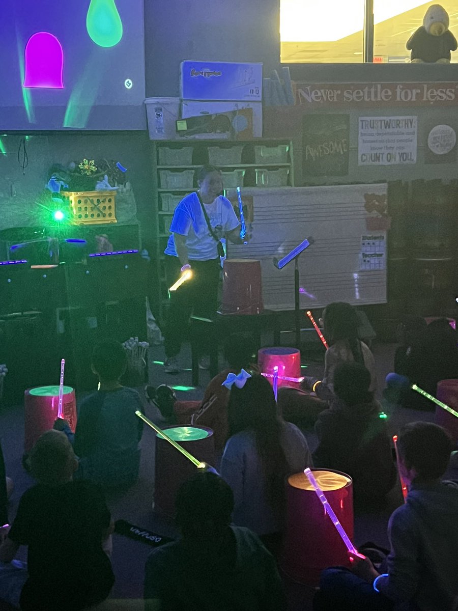 AP_Renner's tweet photo. Our students are so lucky to have a rich and vibrant music program!  They loved the black lights and light up drum sticks that they got to use during their lesson! #MrsBobelRocks https://t.co/AkJ0wAlBvm