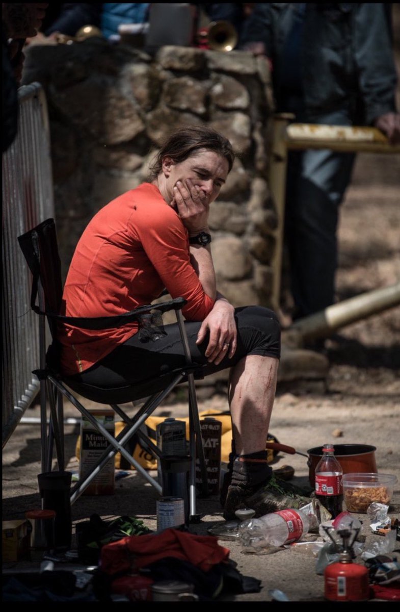 Incredible photo at #barkleymarathon - empty coke bottles, plastic container of pasta, camping chair, chaos everywhere. And there staring into the abyss is @JasminKParis about to make history - WHAT IS SHE THINKING !! #bm100 #smalleuropeanwoman @keithdunn