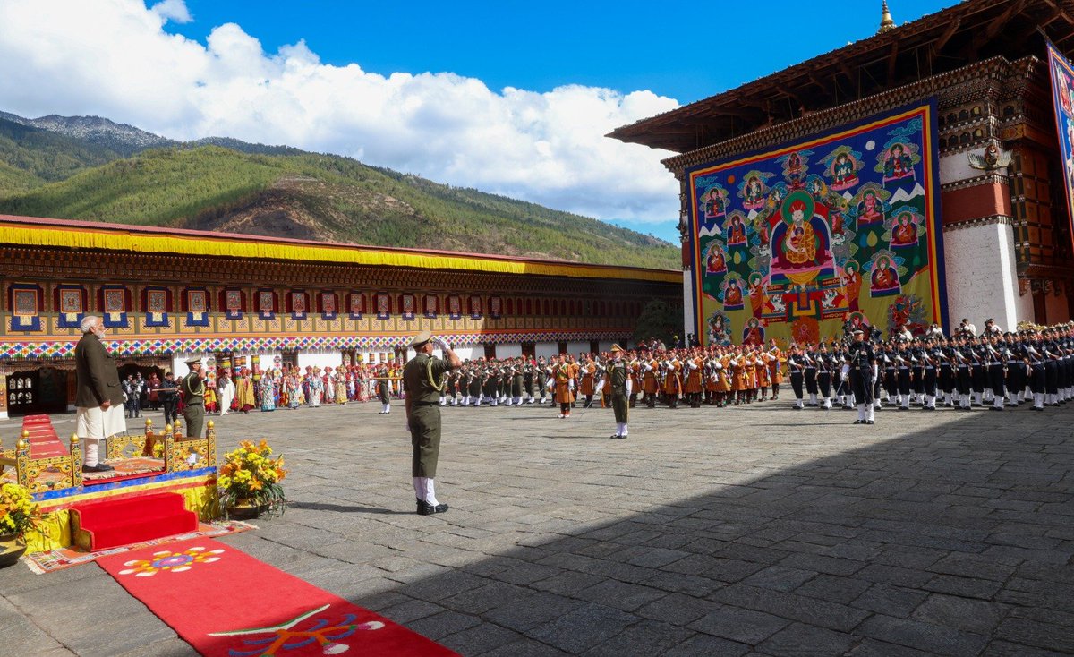 narendramodi's tweet photo. Was humbled by the welcome at the majestic Tashichhodzong Palace in Thimphu. The traditional Chipdrel procession offers a glimpse of the rich culture of Bhutan. https://t.co/849RGU1bgv