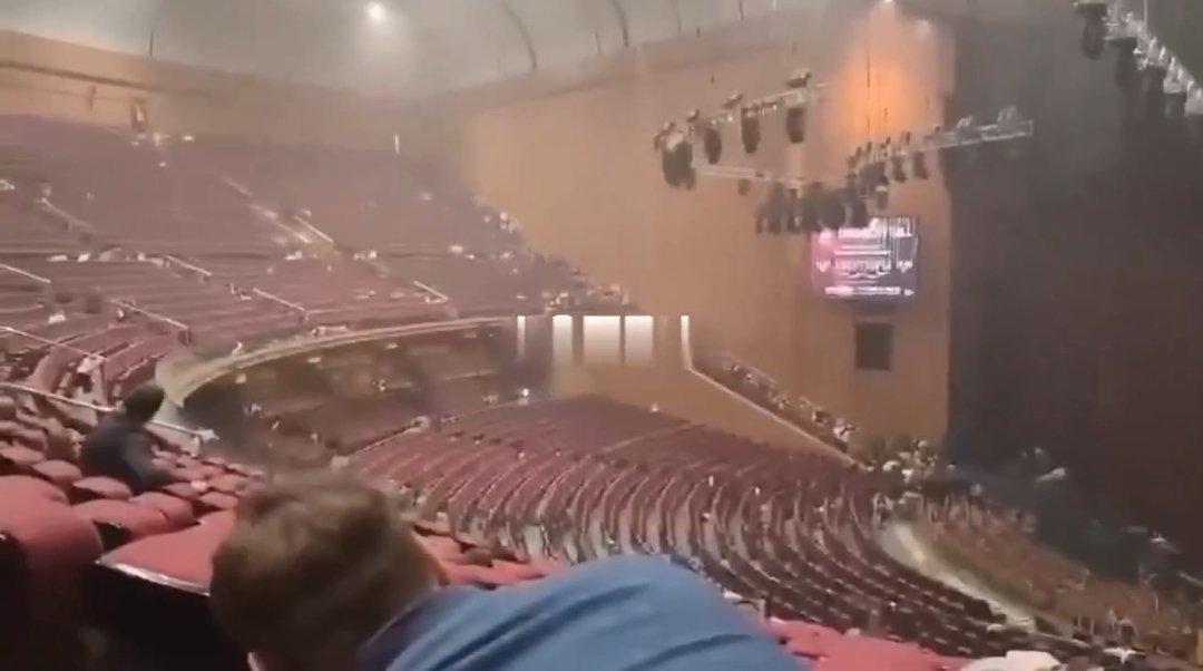 Two screenshots from two different videos. In one case the film TENET by Christopher Nolan, and in the other the Crocus concert hall in Moscow, where the shooting took place today. #Moscow #Crocus #Tenet #Nolan