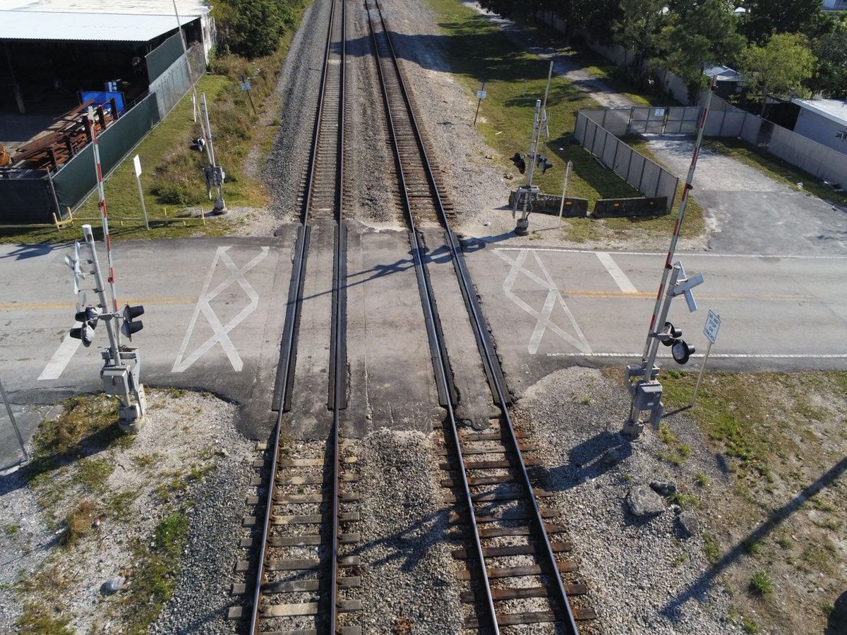 Tri_Rail's tweet photo. Work never stops on the railroad! Check out this recently completed crossing improvement at Dunad Ave. in Opa-Locka. https://t.co/7fxAt0KrjB