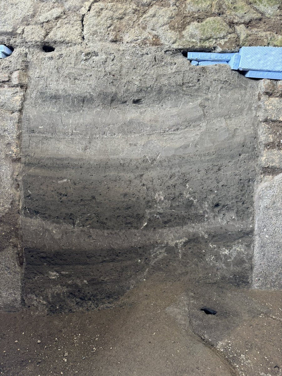 A window in ancient Pompeii still filled with layers of volcano ash that arrived during the 79 AD eruption of Mt Vesuvius as hot clouds mixed with lethal gases and subsequently became solid soil. @pompeii_sites #pompeii #archaeology