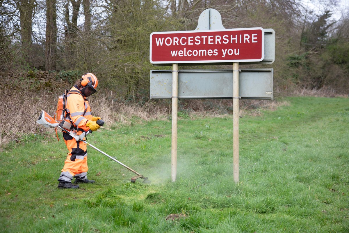 Chris, grass strimming yesterday at the base of a county boundary sign.