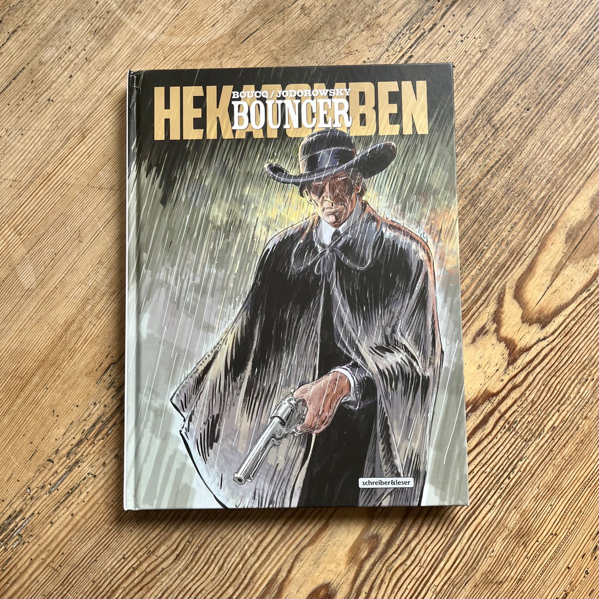 MisterEndres's tweet photo. Nicht nur Bouncer ist zurück, sondern auch Autor Jodorowsky ... Das 12. Album @schreiberleser um den einarmigen Rausschmeißer im wirklich ziemlich wilden Westen hat dann auch gleich mal satte 144 Seiten. #western #comic #bouncer #jodorowsky #boucq https://t.co/mcbmUB7zvb