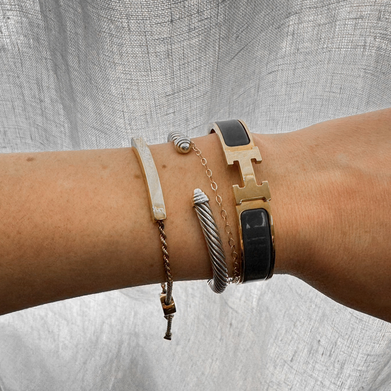 You can never go wrong with classic stack.🤍 This Hermès Clic H Bracelet available online now!