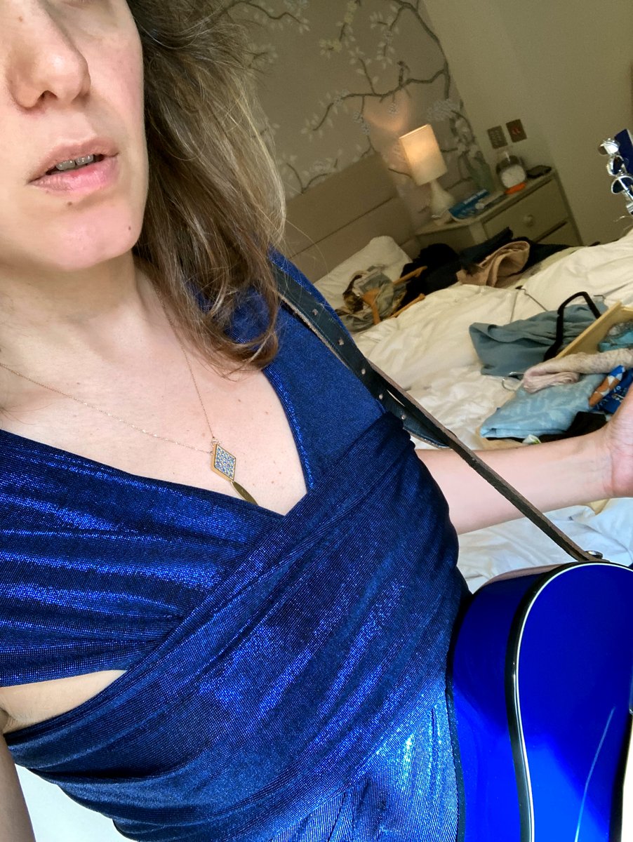 Packing for travels and I want the outfits to match the guitar. Not so easy with a bold azure blue. 💃🏻😎