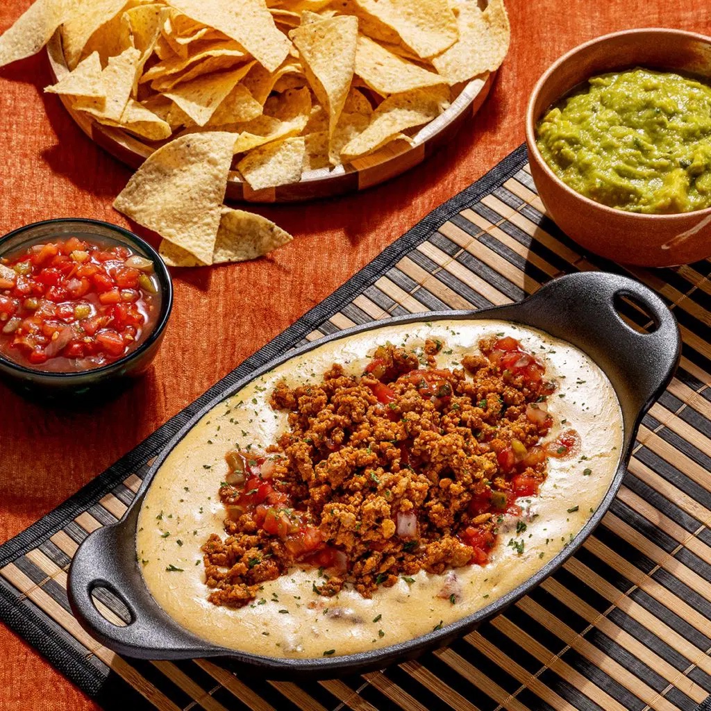 Dip into the ultimate flavors of Ground Pork Queso. Made with flavorful ground pork and creamy queso, this quick and easy dish is sure to delight your taste buds. Spice up your next gathering with the dish you can’t get enough of. bit.ly/3TMyGr9