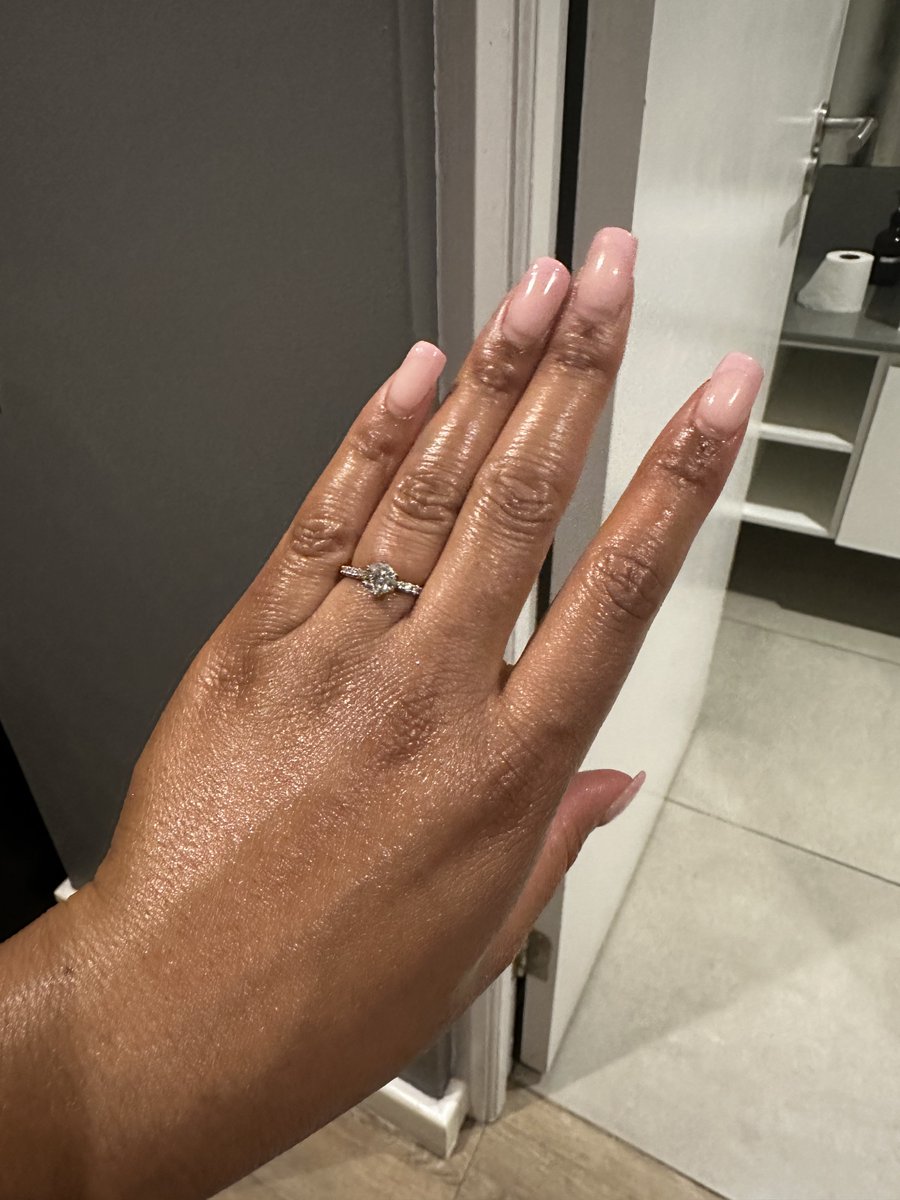 EmaniMone's tweet photo. My man really designed my ring from scratch picked the diamonds from a South African conflict free diamond shop. Designed my ring in platinum bc it’s more sturdy less scratch prone instead of 18k white gold and even got it nature inspired after his countries national flower 🥲 https://t.co/Uf9Rxg4YLh