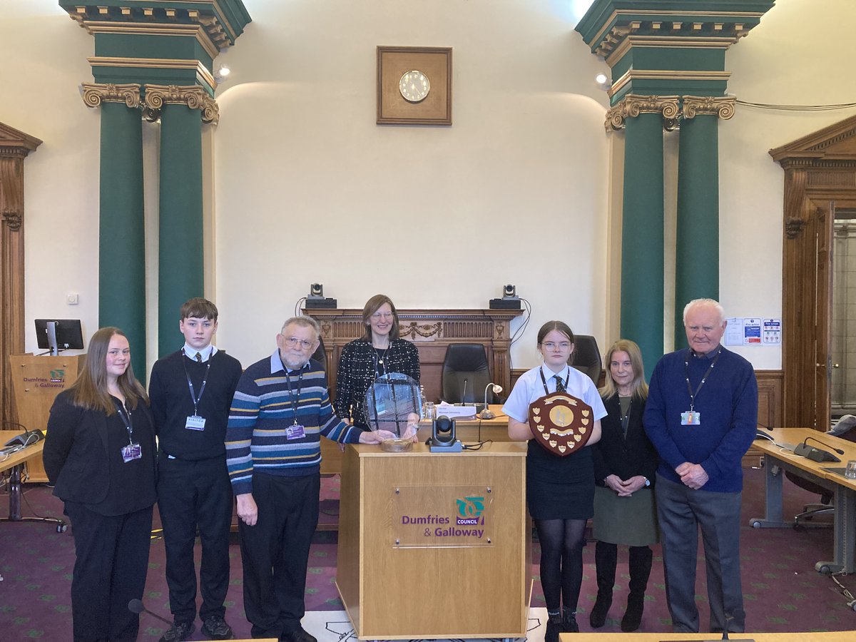 Earlier in March, The Scottish Schools Pipe Band Championship was held. DG Schools’ Pipe Band came 2nd in Junior C . They also won the Eilidh MacLeod Endeavour Award. Thanks to Andrew McCartney for his continued work . Pictured - Councillors, Officers, Pipe Band Members & Andy