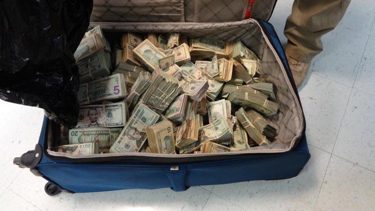 DrMoneyTrees's tweet image. Your luggage gets swapped at the airport and when you open it you find this, what are you doing?