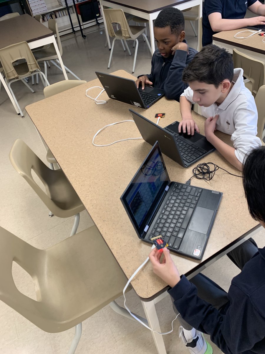 StGregoryCA's tweet photo. Grade 7 PACE students exploring coding through micro:bits. https://t.co/0sihIdSBvu