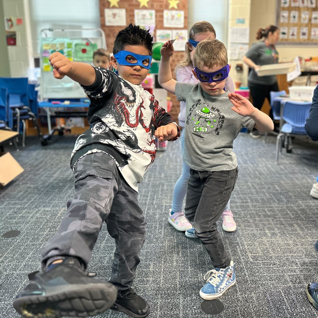 D54schools's tweet photo. If you’re looking for somewhere that has ninjas, bubbles, slime, parachutes, glow-in-dark rooms AND you can get in a game of quidditch all under one roof, @EndersSalk has you covered! It’s an all-day celebration of literacy and happiness at the Read Across Enders event today 📚🦅 https://t.co/Vm3OS0YylN