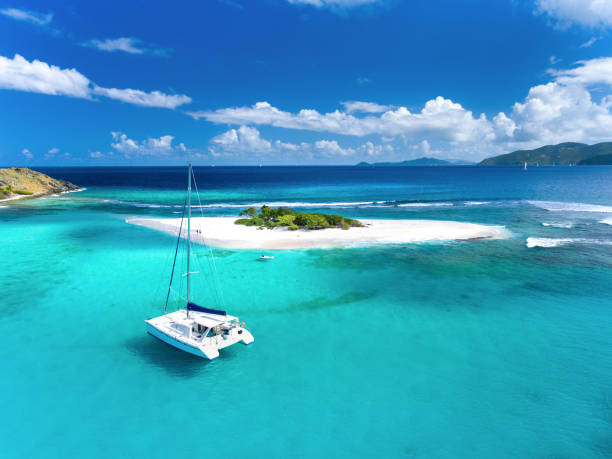 USVirginIslan's tweet photo. Lost in #paradise 🌴✨ Cruising through crystal-clear waters, soaking up the #Caribbean sun on this stunning #catamaran. #SandySpit, you've stolen my heart! 😍🌊 #CaribbeanDreams #CatamaranLife https://t.co/56yQKM7e2N