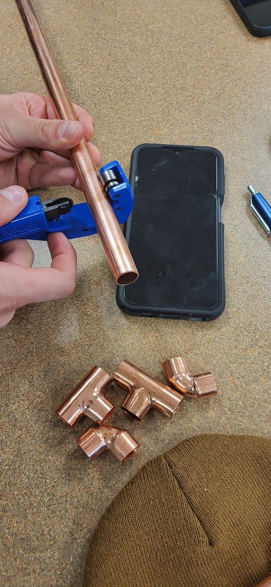 Copper pipe cut and ready for solder in Intro to the Trades at <a href="/cchschool/">Catholic Central</a>. Lots of phone / tablet holders, as well as a candle holder! Thanks to <a href="/WolseleyCanada/">WolseleyCanada</a>, @SLTrailerCorp, and Bartle &amp; Gibson for donating the pipe, solder, flux, and tools!  <a href="/HolySpiritRCSD/">Holy Spirit Catholic School Division</a>