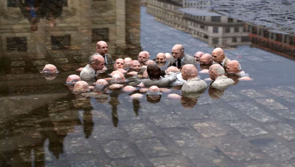 Follow the leaders or “Politicians discussing global warming” by Isaac Cordal