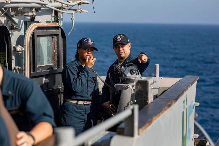 Can you hear me? 📍 RED SEA (Feb. 23, 2024) A Lt. j.g. and Master-at-Arms participate in a general quarters drill aboard the Ticonderoga-class guided-missile cruiser USS Philippine Sea (CG 58) in the Red Sea. As a part of the Dwight D. Eisenhower Carrier Strike Group