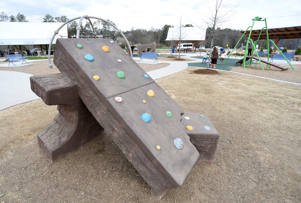 Staff photographer Matt Hamilton captured these images of children playing at Little Debbie Park in Collegedale on Friday.