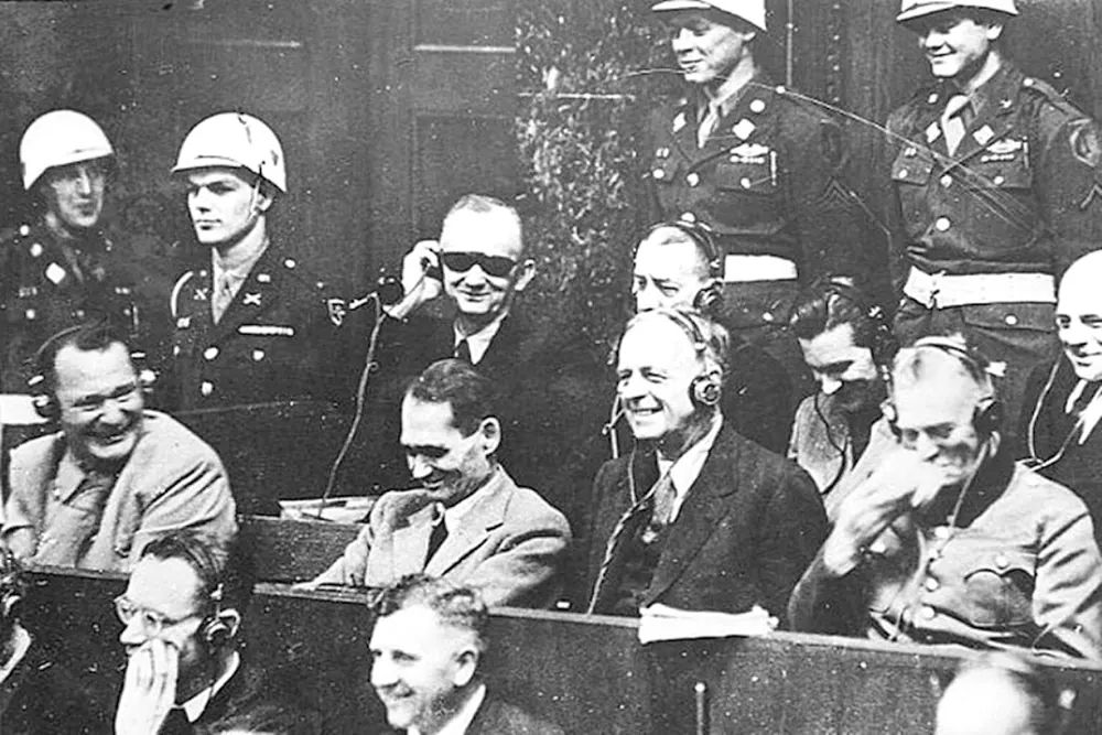 fasc1nate's tweet image. Defendants laugh during the Nuremberg Trials.