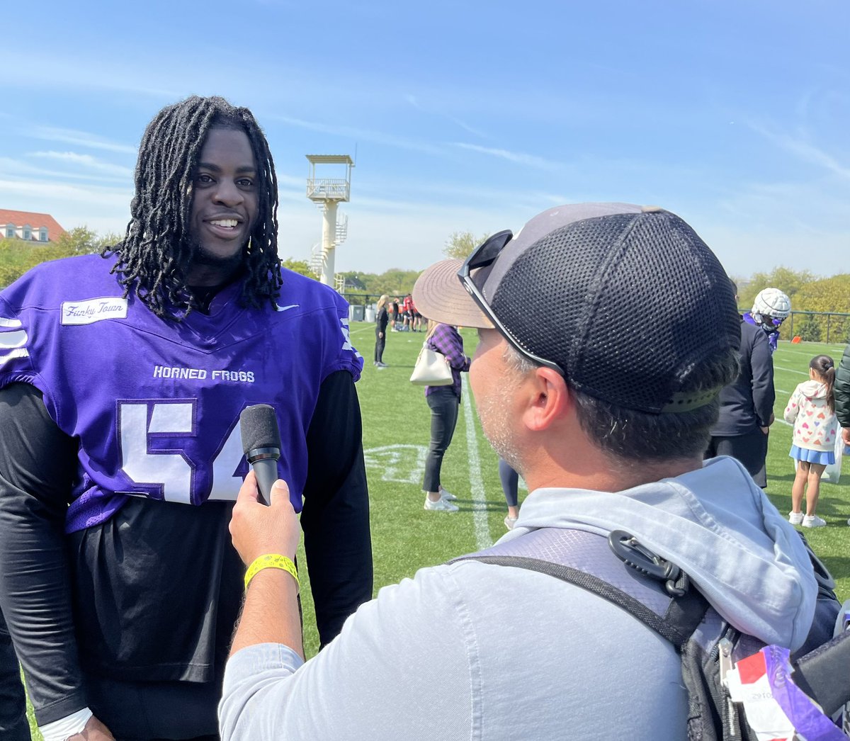 TCU defensive lineman @NaNaOsafo2 visiting post-practice with @JClarkHFB247!