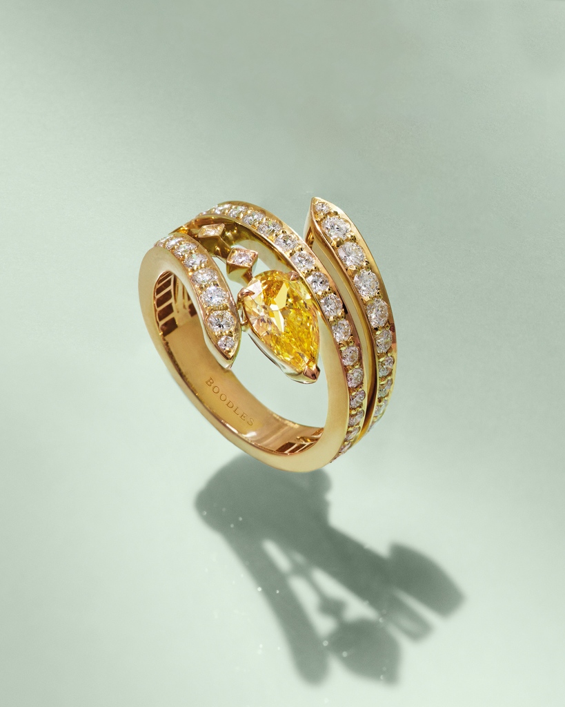 Crafted with Single Mine Origin yellow gold, this 'Peace of Mined' ring features a remarkable pear-shaped yellow diamond from the Cullinan Mine. ⁠ ⁠#Boodles #PeaceofMined ⁠