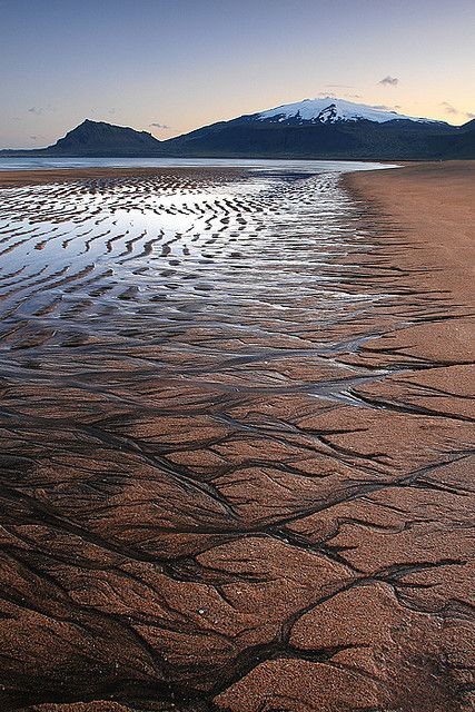 Snæfellsjökull Photo by orvaratli on flickr. Sandy beach near the snæfellsjökull glacier.