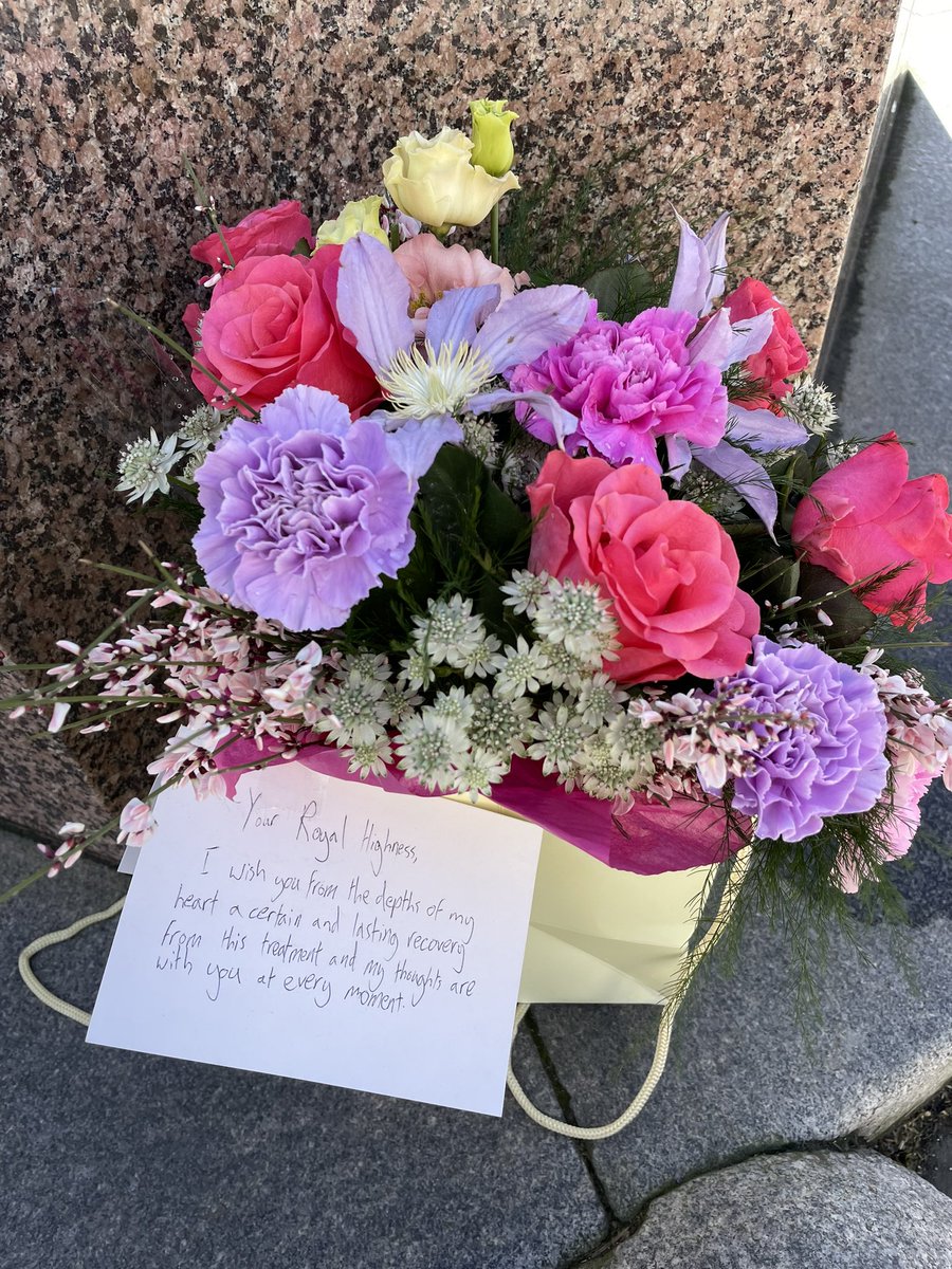 Flowers and a message of support for The Princess of Wales, placed outside Windsor Castle this afternoon by a member of the public.
