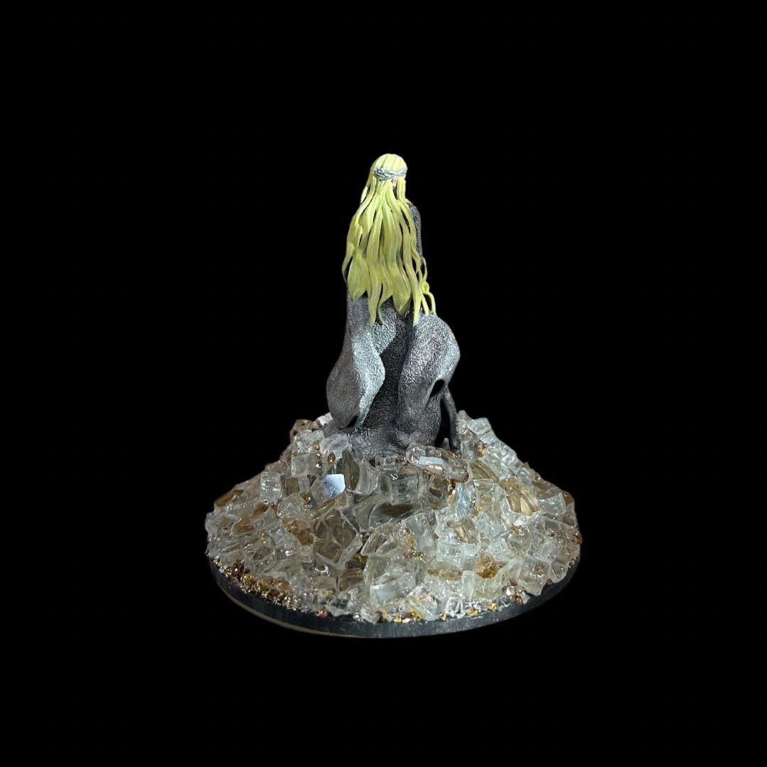 sillypodge's tweet photo. I’m tickled with how this turned out. I had a vision for the base and am so happy I could bring it to life! The base is glass pieces and glass sand. 

#paintingminiatures #inspiredby #LOTR #galadriel https://t.co/0T6q2Aw9ep