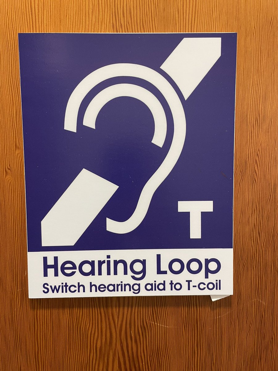 HLAAWaState's tweet image. A #HearingLoop makes a venue hearing-accessible. People with #HearingLoss can switch their hearing aid or CI to T or Telecoil mode to hear the sound directly, bypassing competing noise.