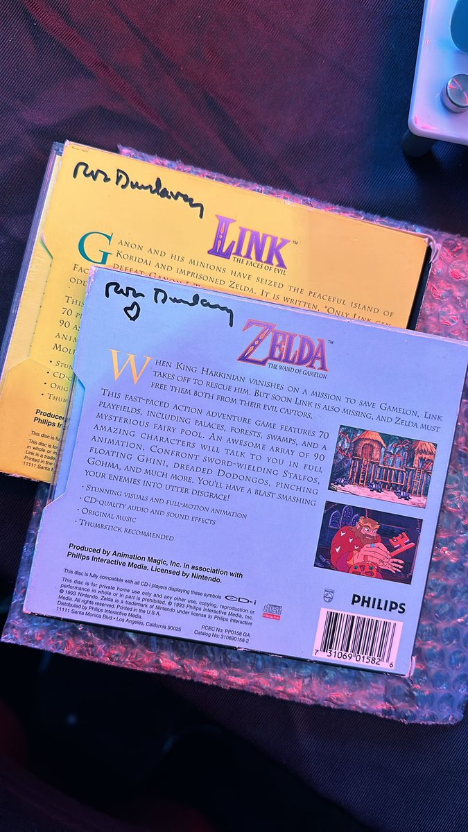 My dear friend @SpidrJessie took my copies of the Animation Magic CD-i Zelda games on a field trip to PAX East and got them signed by Jeffrey Rath (Voice of Link), Bonniejean Wilbur (Voice of Zelda), and Rob Dunlavey (artist for all the paintings in both games)

!!!!!!!!!!!!!!!!!