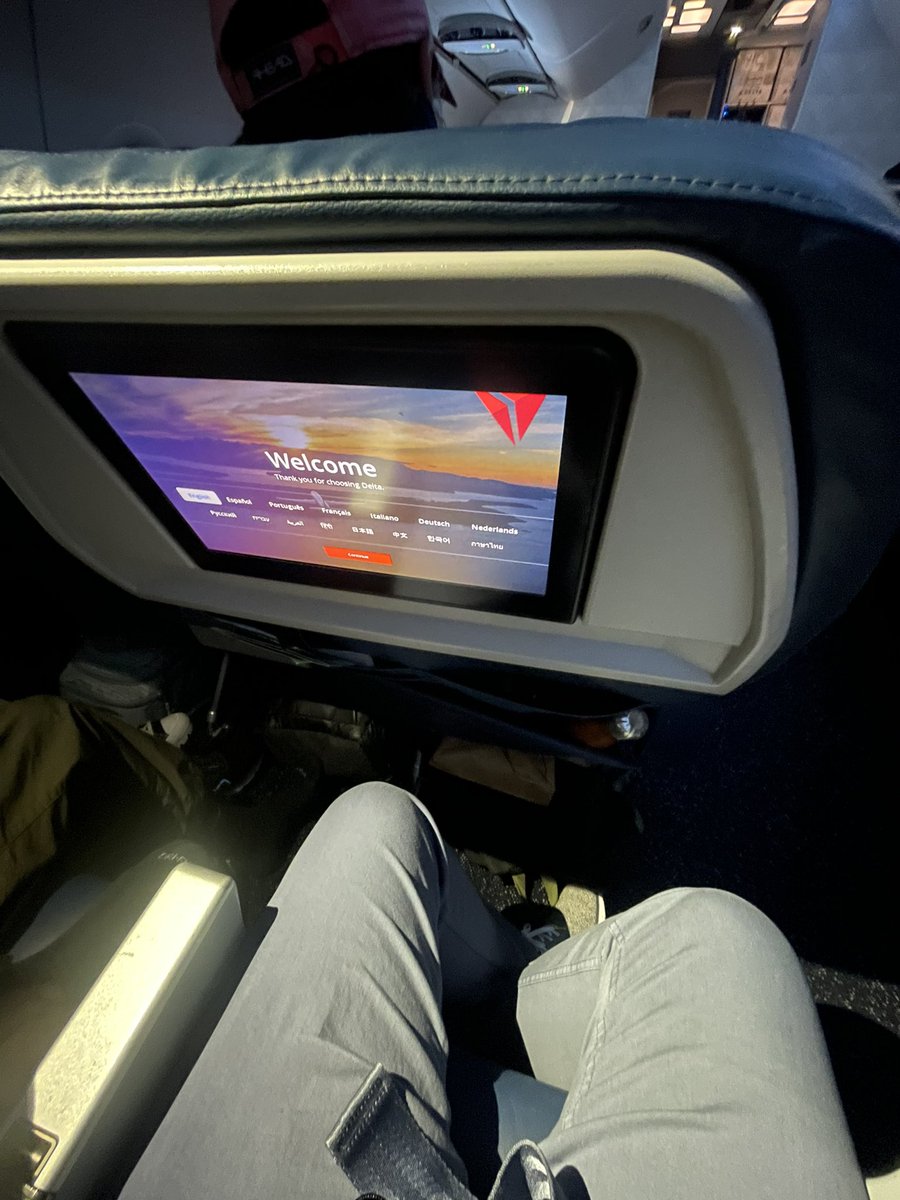 8thstMeat's tweet photo. @Delta  am in supposed to watch tv like this?? I get the person is in first class and I am in comfort + but this angle seems ridiculous. 😂 https://t.co/dax72pXYB5