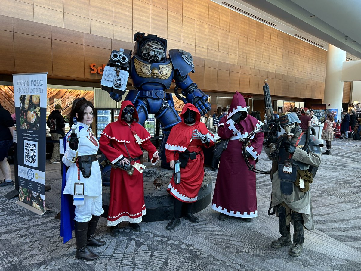 Finally wearing my #lotarasarrin #cosplay at #adepticon ! Found some #techpriest s and a #dkok ! Good men as long as they keep the ship running. #worldeaters #horusheresy #warhammer #warhammercommunity #chaos #costume