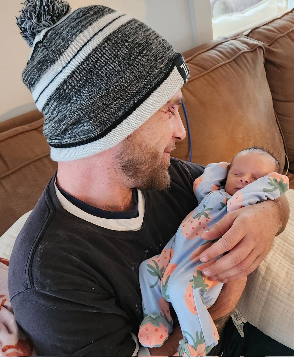 My older son has never held a baby... here he is holding his niece, his brother's little girl 🫠🫠 that face... both of them