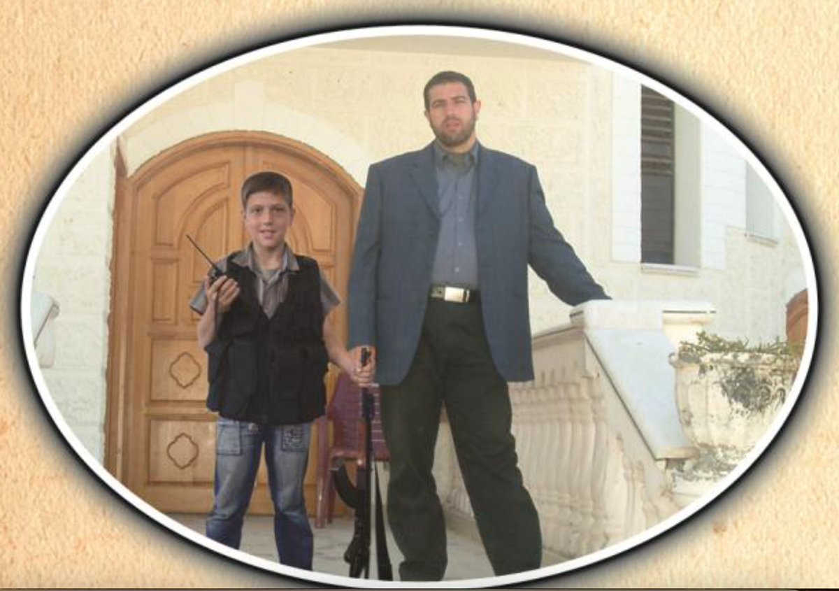Hillel Neuer (@hillelneuer) on Twitter photo 7/ According to the Islamic Jihad, the chief of their engineering unit Awad al-Qiq was the youngest school principal in UNRWA history. Here he is teaching his young son to be a terrorist. <a href="/UNLazzarini/">Philippe Lazzarini</a> says her doesn't know anything about terrorism in UNRWA. 7/ According to the Islamic Jihad, the chief of their engineering unit Awad al-Qiq was the youngest school principal in UNRWA history. Here he is teaching his young son to be a terrorist. <a href="/UNLazzarini/">Philippe Lazzarini</a> says her doesn't know anything about terrorism in UNRWA.