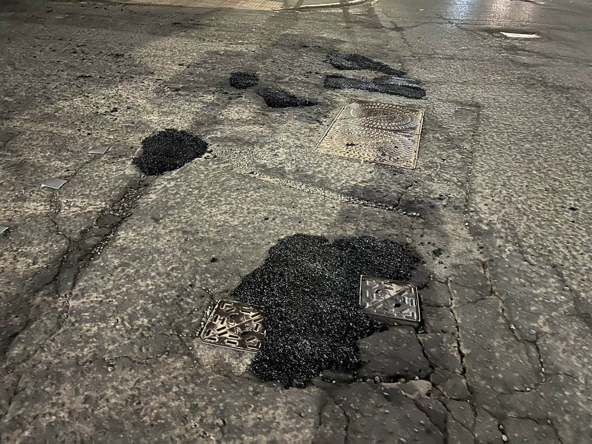 This is the splattering of crappy tarmac thrown down on a main junction at 9.15pm on a Saturday night to resolve the pothole issue in the Capital. It took less than two minutes and won’t last much longer. #edinburghcouncil #thisisedinburgh #edinburghlive